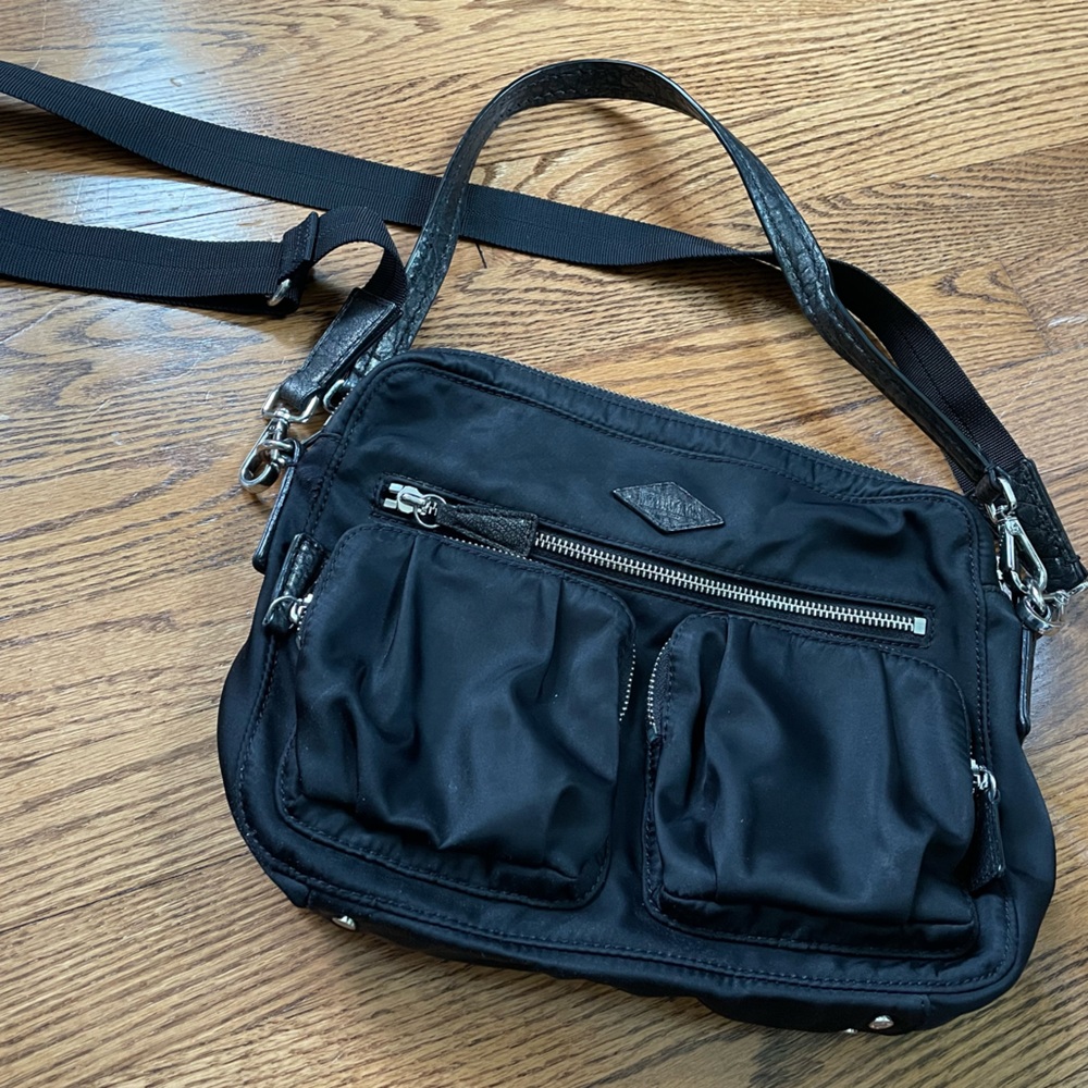 Sleek Black Crossbody MZ Wallace with leather accents